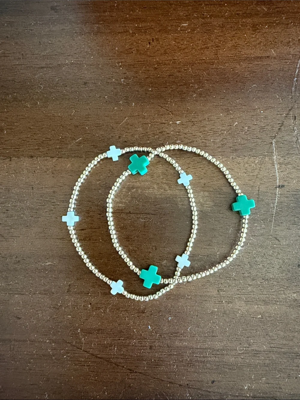 2 enewton Cross Bracelets